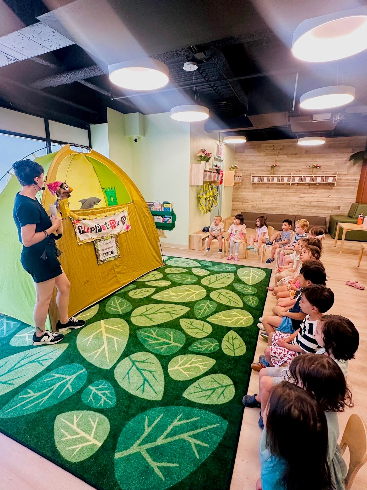 Child engaged in Puppetsburg activity