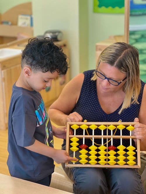Child engaged in Abacus Mental Math activity