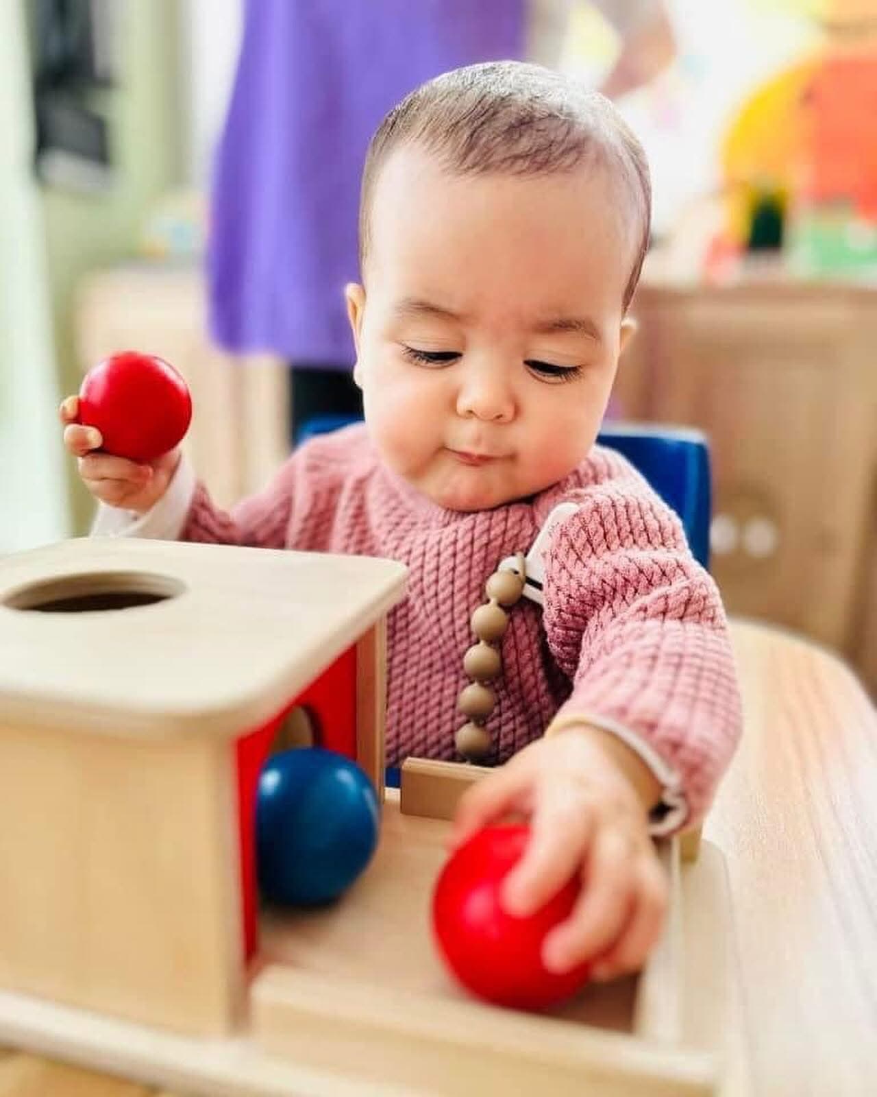 Child engaged in Montessori learning activity