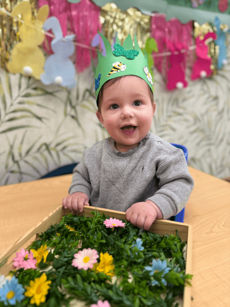 Infant enjoying spring sensory activity